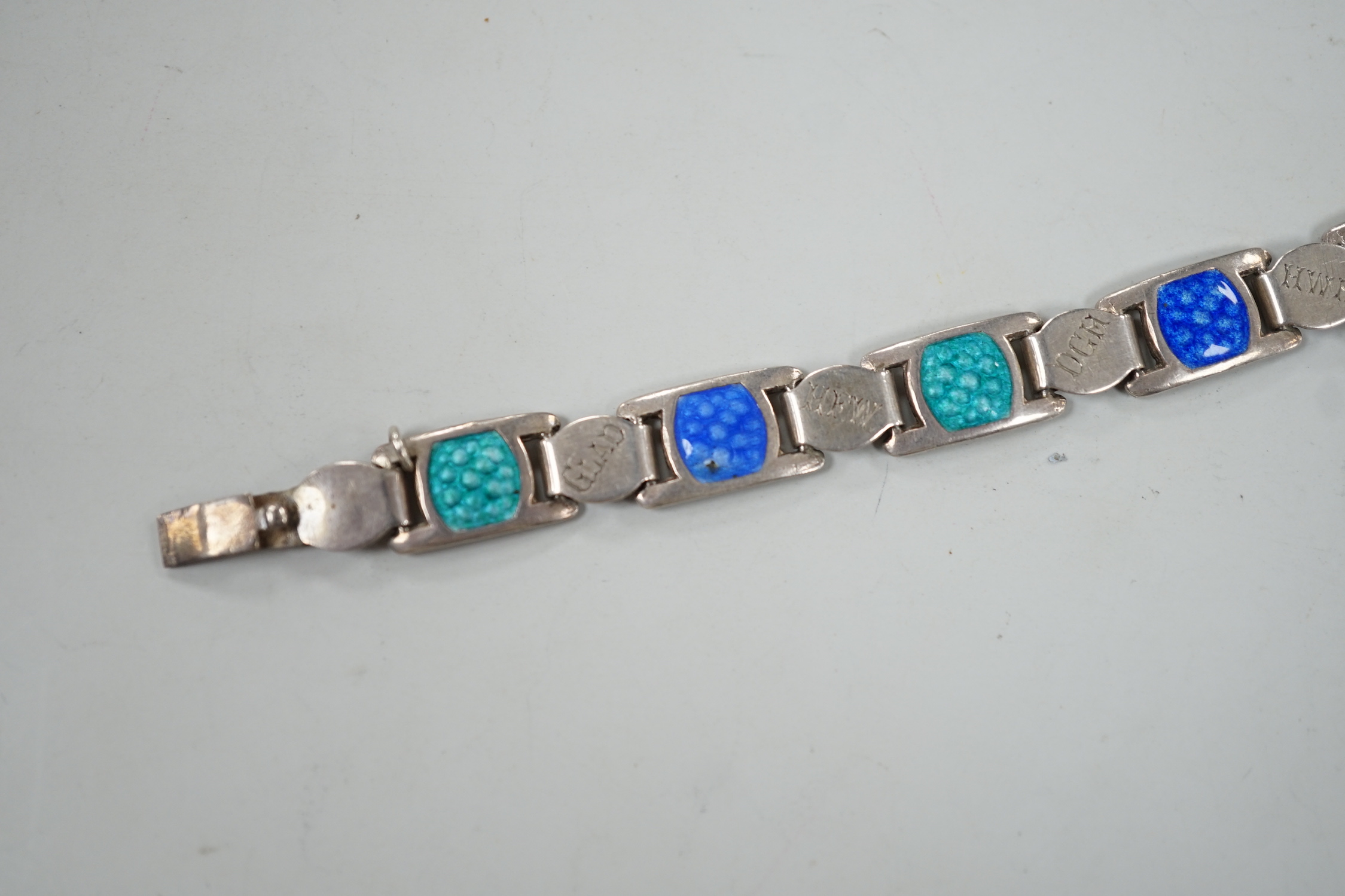 An Edwardian silver and two colour enamel bracelet, engraved with initials and words, 19cm.